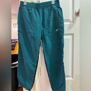Selling Reebok Mens meet you there woven Athletic jogger pants